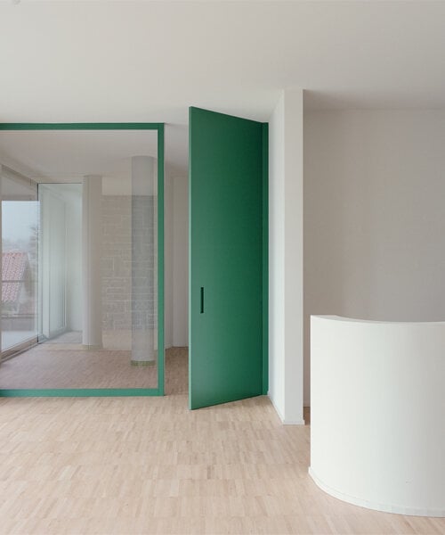 stefano larotonda uplifts italian villa's 1960s modernist volumes with vivid green hue